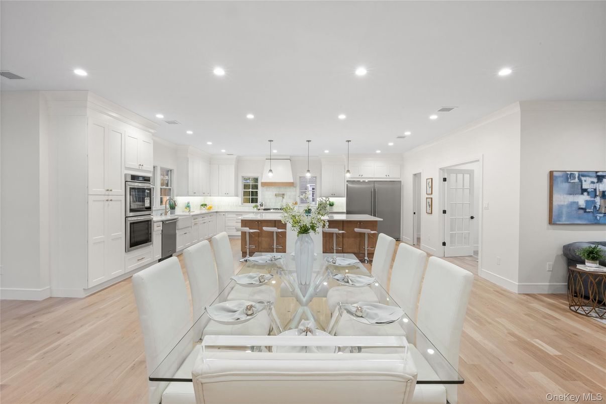 Dining room, Interior, Kitchen, Pendant Lights, Recessed Lighting, Stainless Steel Appliances, Wood Texture Flooring
