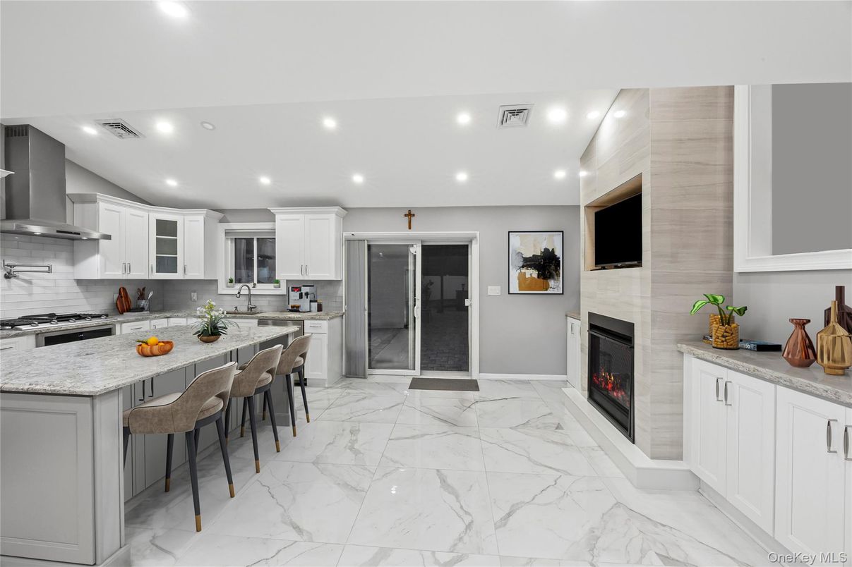 Fireplace, Interior, Kitchen, Marble, Recessed Lighting, Stainless Steel Appliances