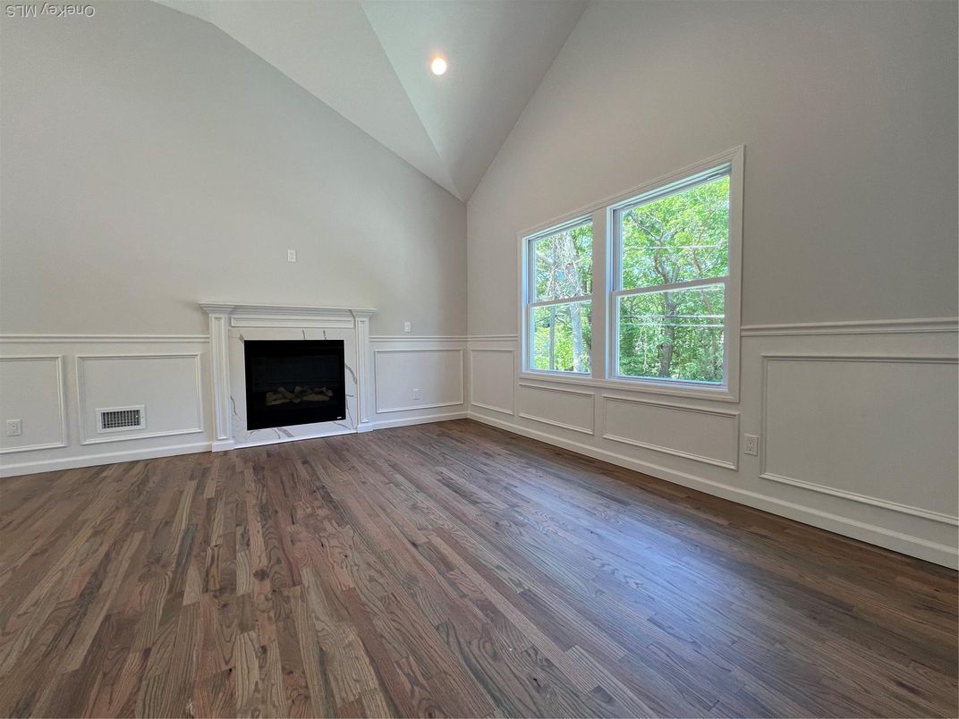 Empty room, Fireplace, Interior, Recessed Lighting, Wood Texture Flooring
