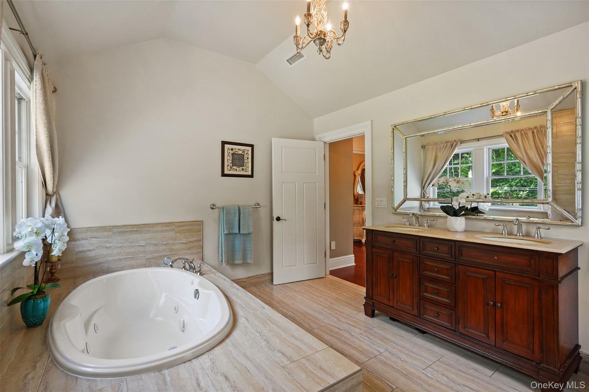Bathroom, Chandelier, Dual Sink Vanities, Interior, Wood Texture Flooring