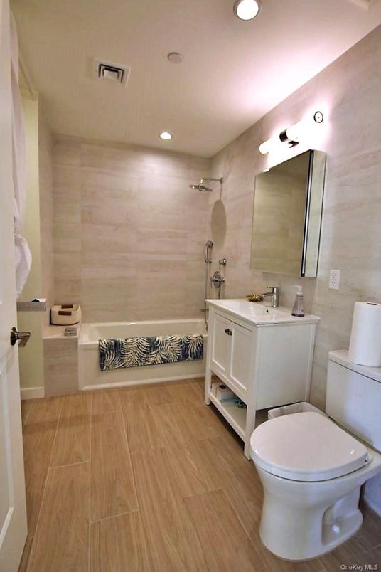 Bathroom, Dual Sink Vanities, Interior, Recessed Lighting, Wood Texture Flooring
