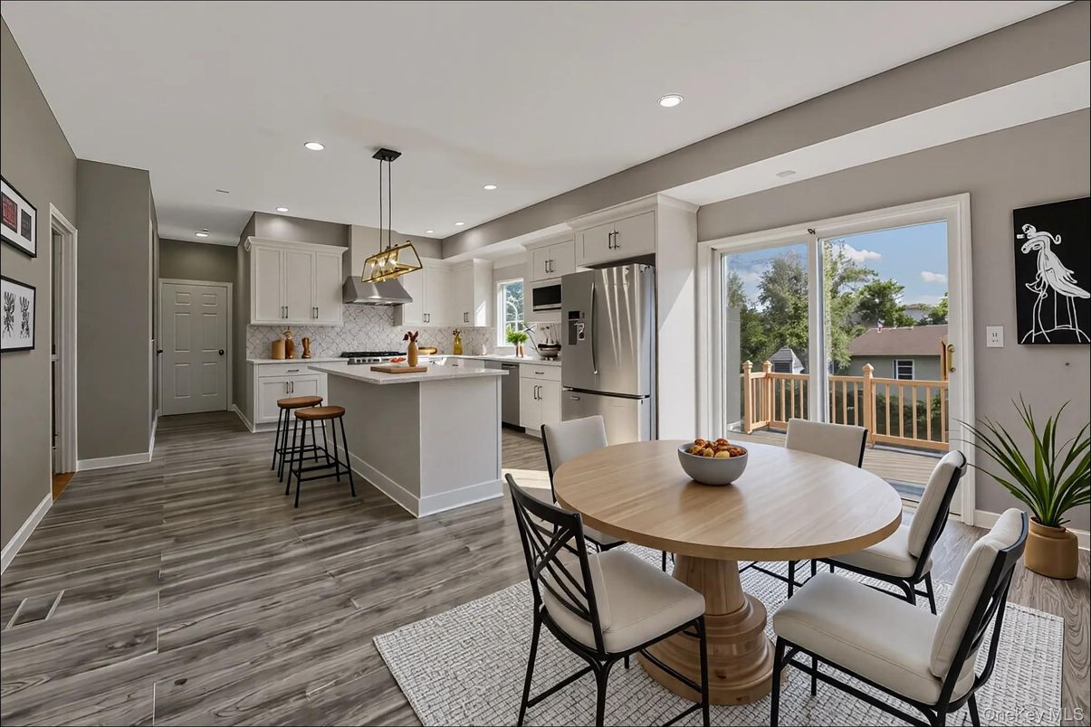 Dining room, Interior, Kitchen, Pendant Lights, Recessed Lighting, Stainless Steel Appliances, Wood Texture Flooring