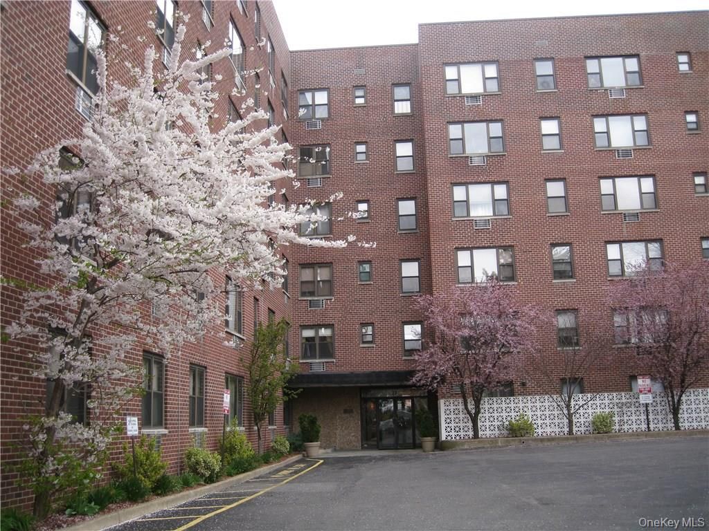 Exterior, Facade, Brick Facade, Condo Building