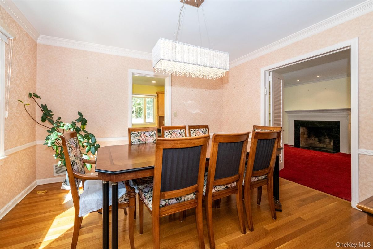 Chandelier, Dining room, Fireplace, Interior, Recessed Lighting, Wood Texture Flooring