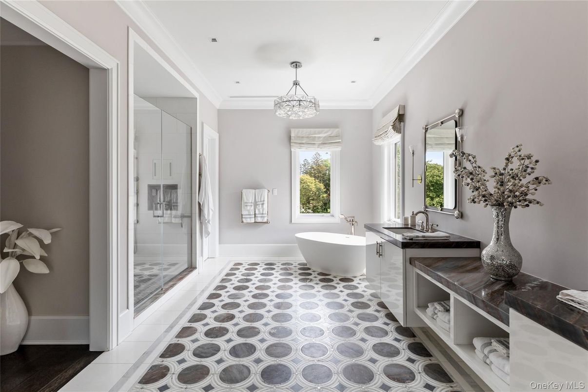 Bathroom, Chandelier, Dual Sink Vanities, Free Standing Baths, Glass Shower, Interior, Pendant Lights, Recessed Lighting