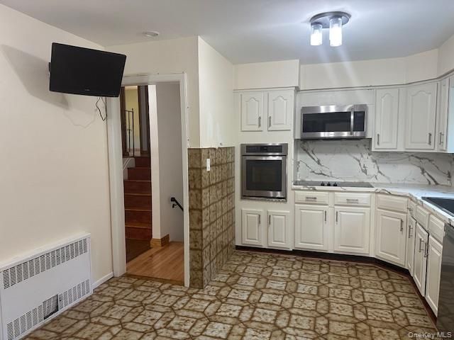 Interior, Kitchen, Marble Walls, Stainless Steel Appliances, Wood Texture Flooring