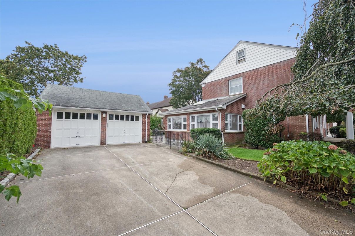 Attached, Detached Garage, Exterior, Facade, Brick Facade, Cape Cod