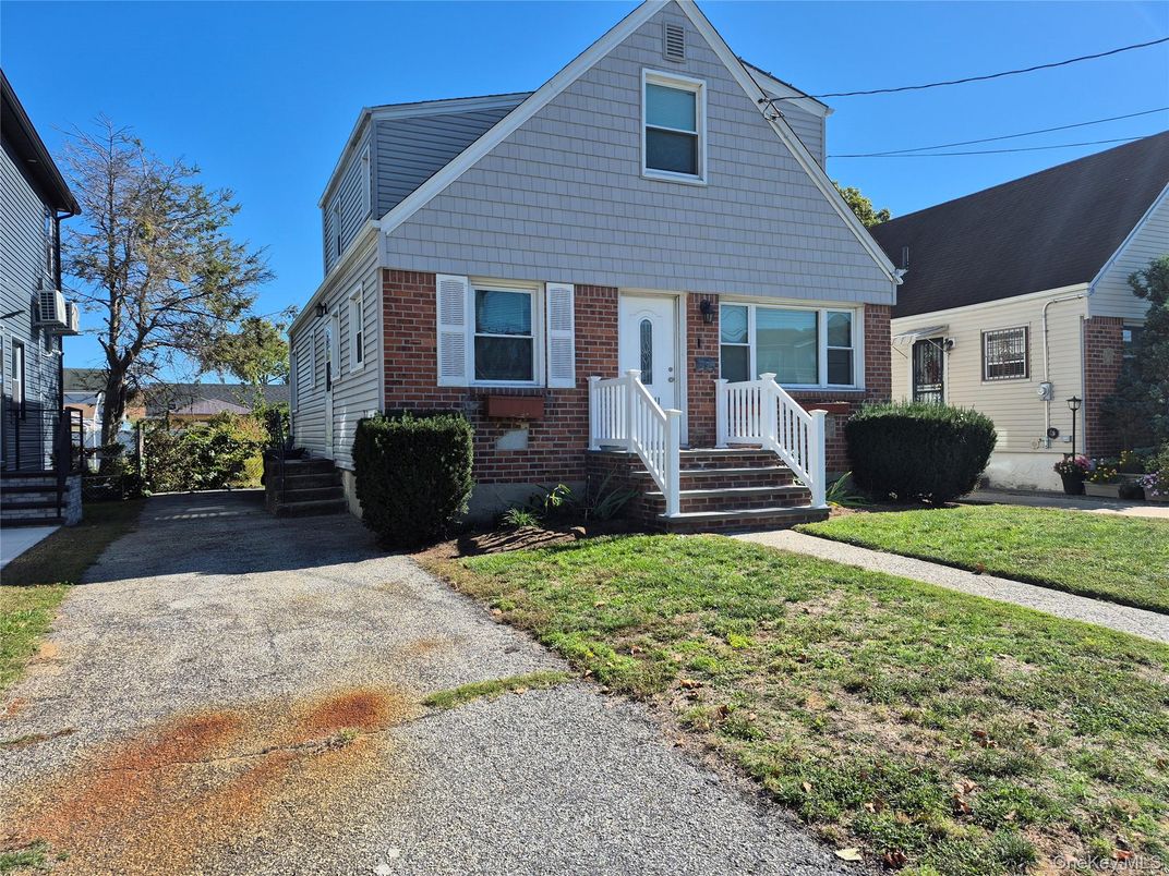 Exterior, Facade, Brick Facade, Cape Cod