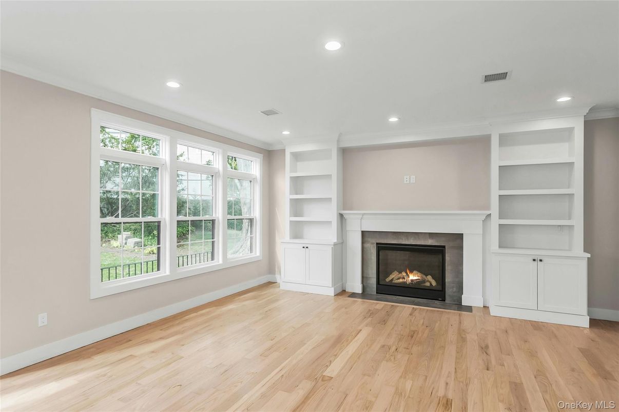 Empty room, Fireplace, Interior, Recessed Lighting, Wood Texture Flooring
