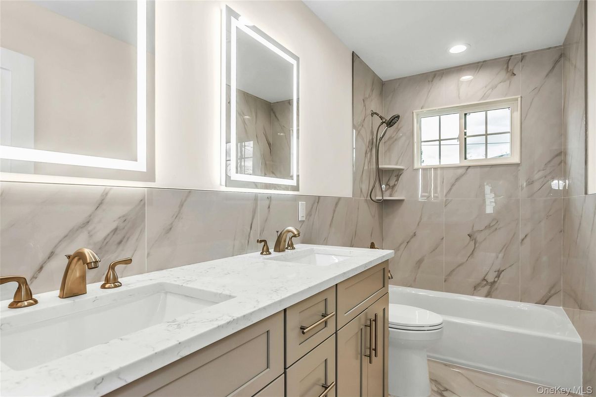 Bathroom, Dual Sink Vanities, Interior, Marble Walls, Recessed Lighting