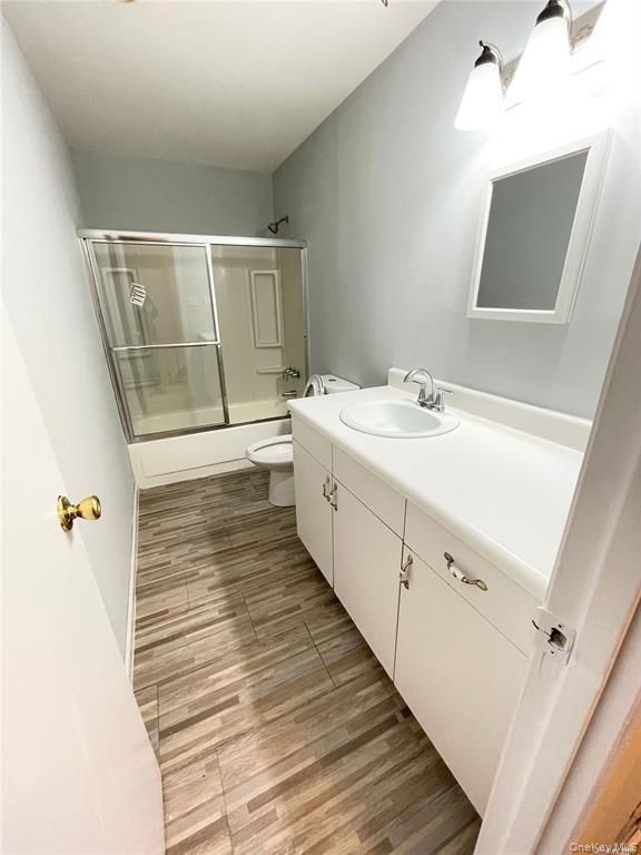 Bathroom, Dual Sink Vanities, Glass Shower, Interior, Wood Texture Flooring