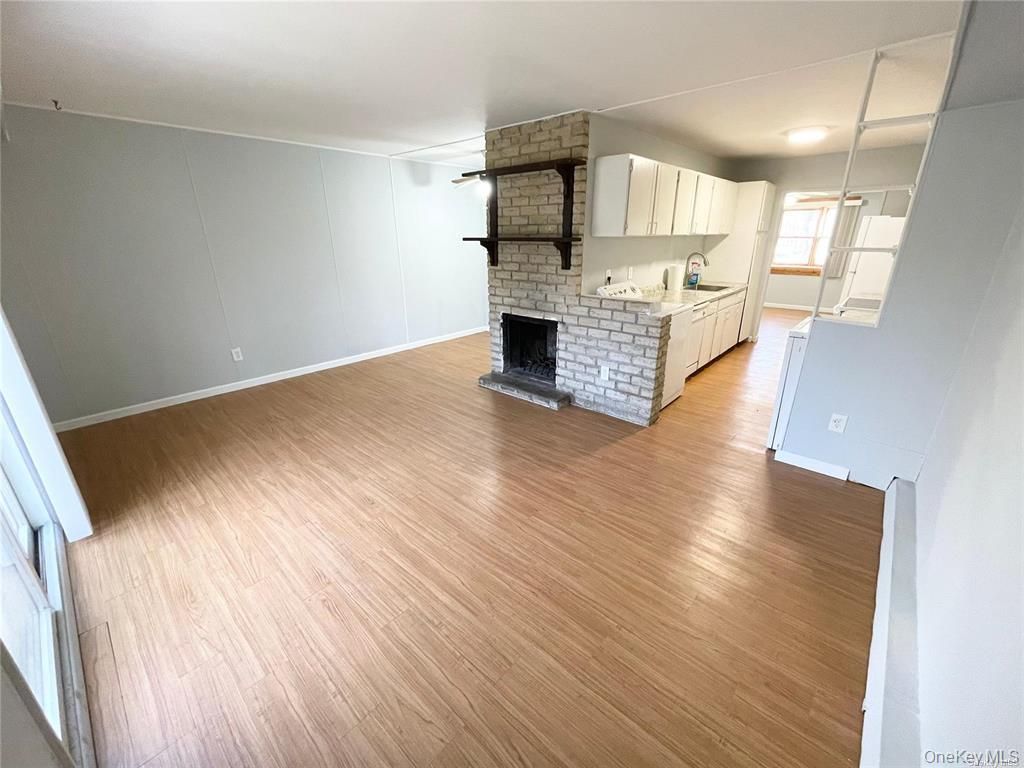 Empty room, Fireplace, Interior, Stone Walls, Wood Texture Flooring