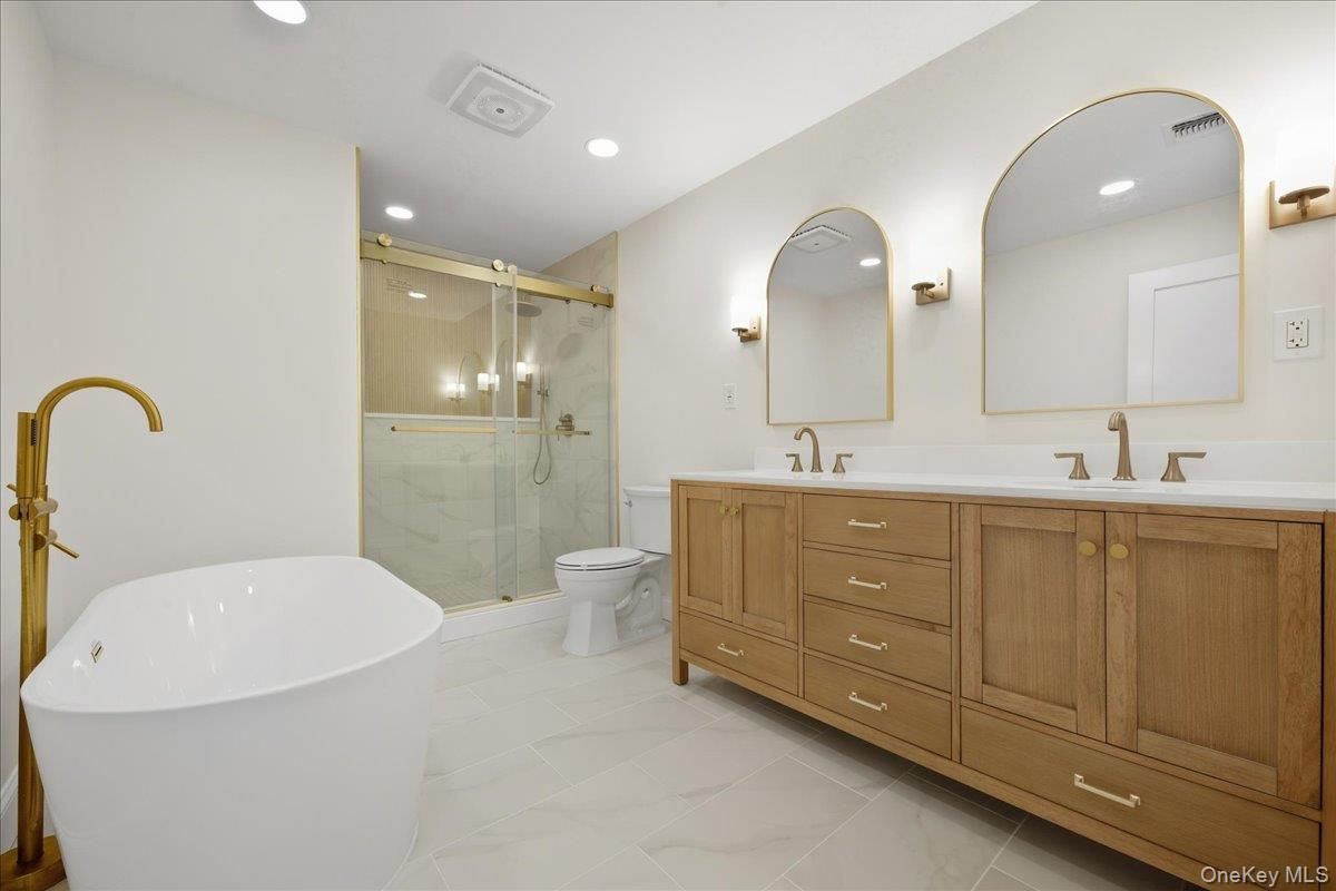 Bathroom, Dual Sink Vanities, Free Standing Baths, Glass Shower, Interior, Recessed Lighting