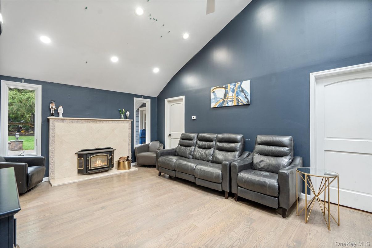 Fireplace, Interior, Living room, Recessed Lighting, Wood Texture Flooring