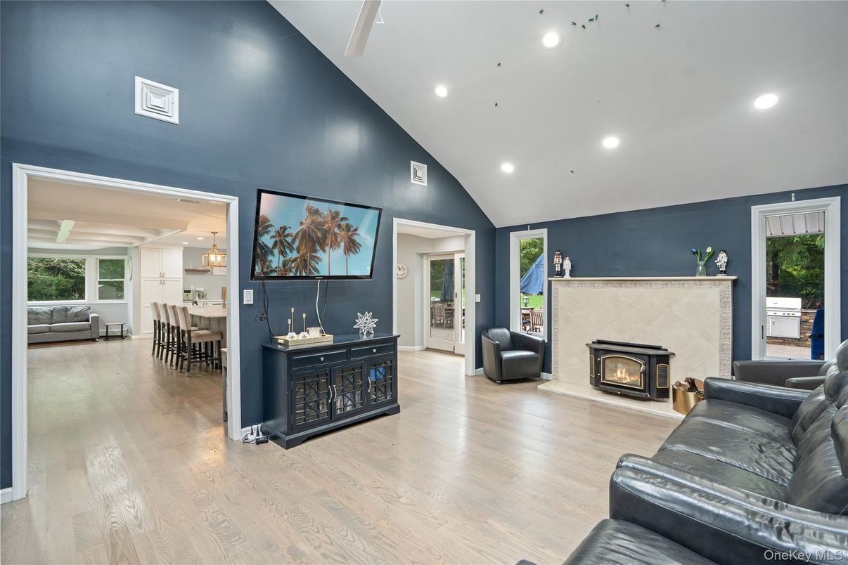 Dining room, Fireplace, Interior, Living room, Pendant Lights, Recessed Lighting, Wood Texture Flooring