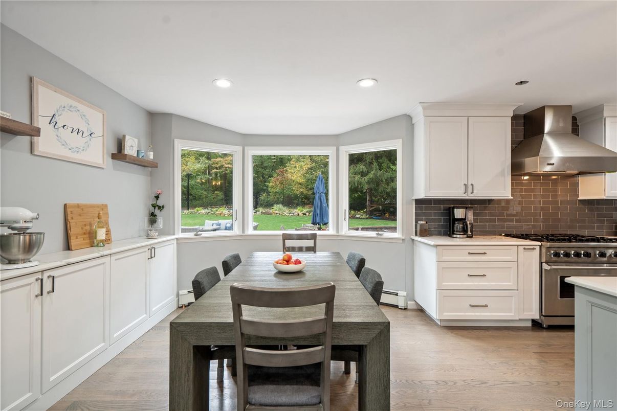 Dining room, Interior, Kitchen, Recessed Lighting, Stainless Steel Appliances, Wood Texture Flooring