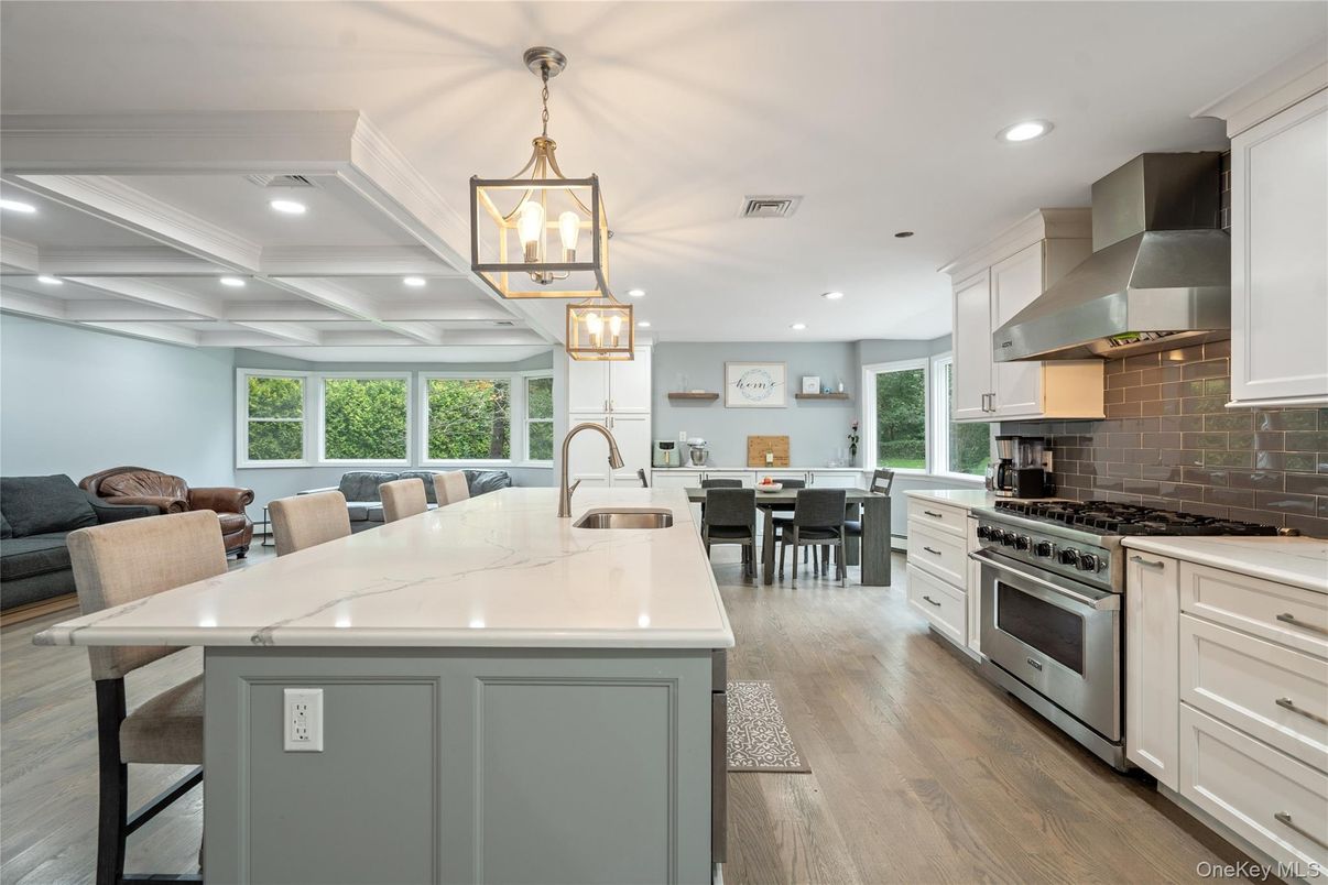 Dining room, Interior, Kitchen, Pendant Lights, Recessed Lighting, Stainless Steel Appliances, Wood Texture Flooring