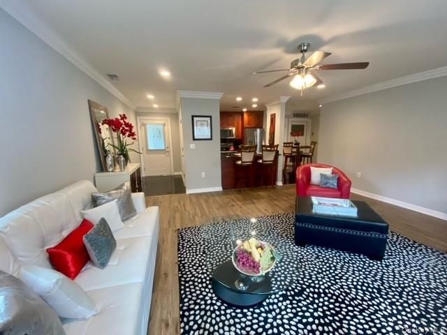 Dining room, Interior, Kitchen, Living room, Recessed Lighting, Stainless Steel Appliances, Wood Texture Flooring