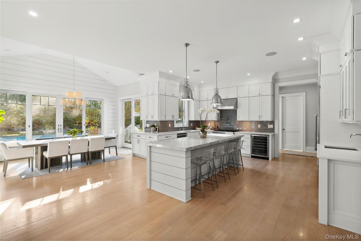 Dining room, Interior, Kitchen, Pendant Lights, Recessed Lighting, Stainless Steel Appliances, Wood Texture Flooring
