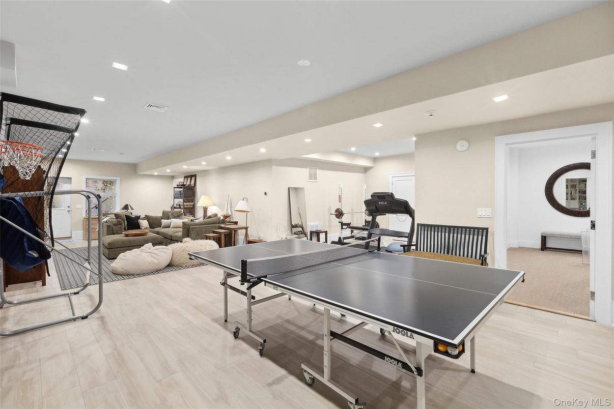 Fitness Equipment, Game Room, Interior, Living room, Recessed Lighting, Wood Texture Flooring