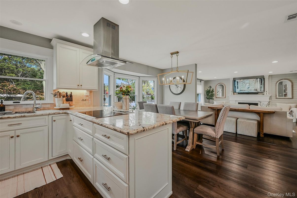 Chandelier, Dining room, Interior, Kitchen, Living room, Pendant Lights, Recessed Lighting, Wood Texture Flooring