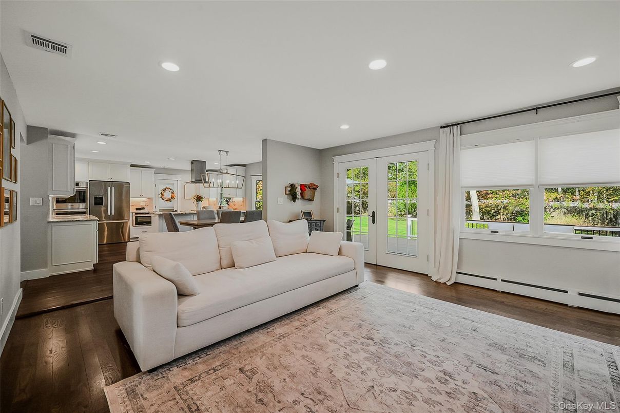Dining room, Interior, Kitchen, Living room, Pendant Lights, Recessed Lighting, Stainless Steel Appliances, Wood Texture Flooring