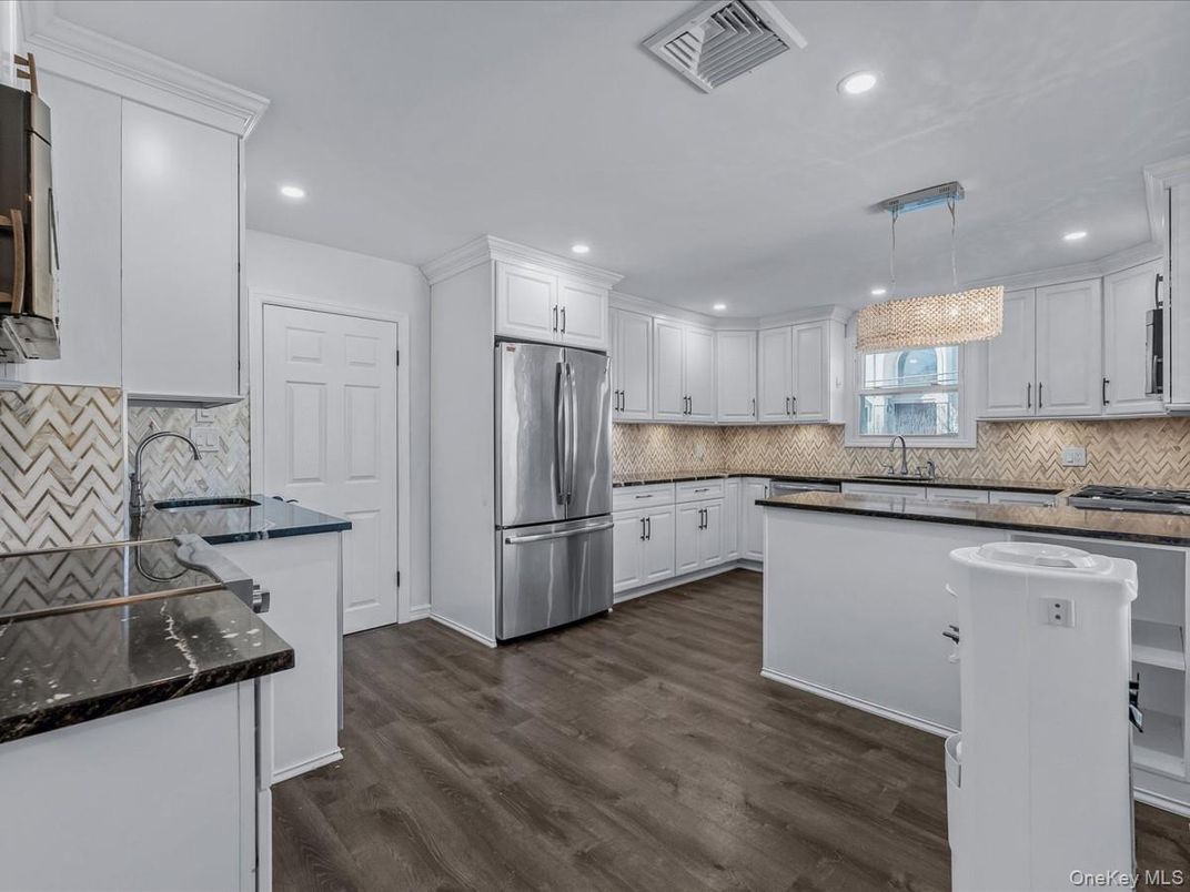 Chandelier, Interior, Kitchen, Pendant Lights, Recessed Lighting, Stainless Steel Appliances, Wood Texture Flooring