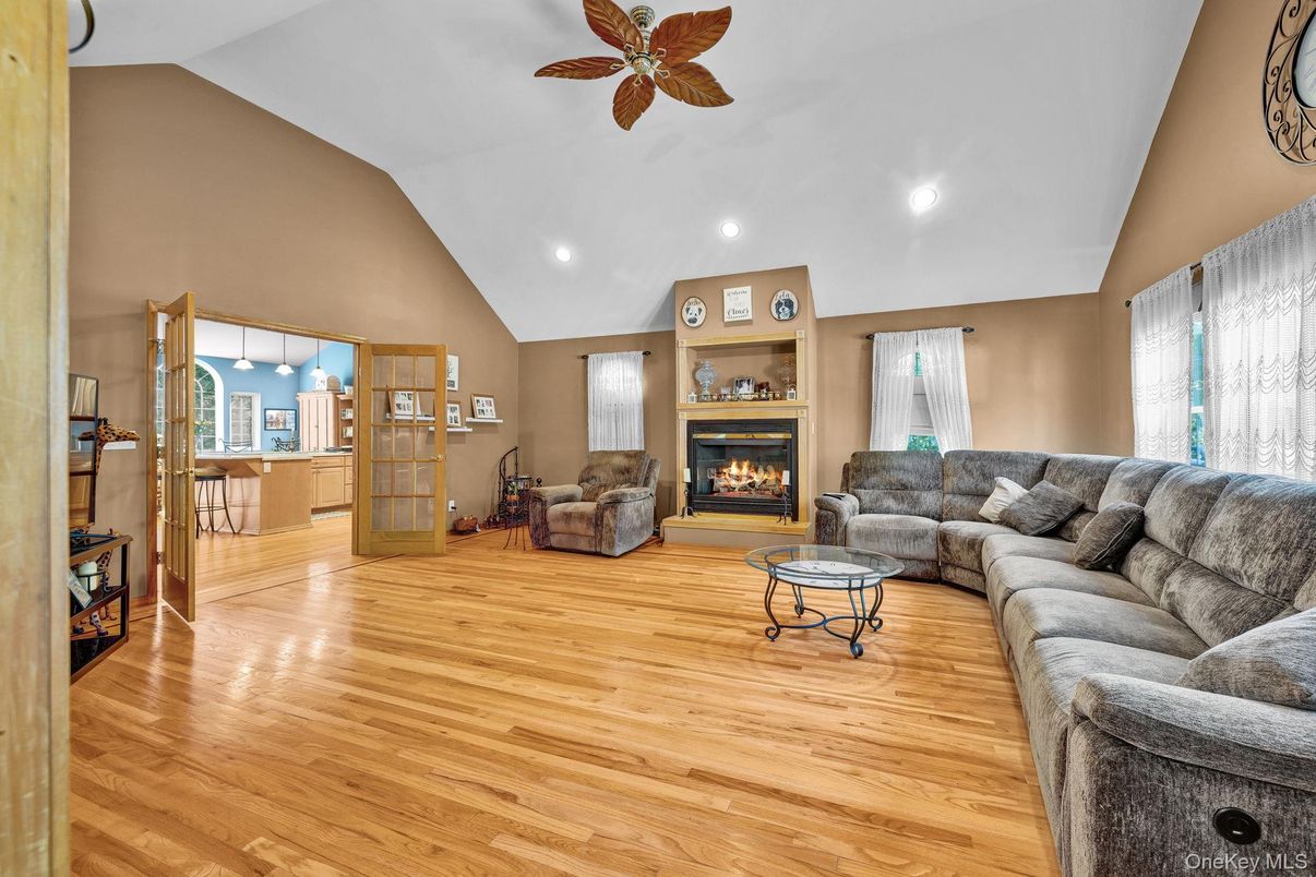 Fireplace, Interior, Living room, Recessed Lighting, Wood Texture Flooring