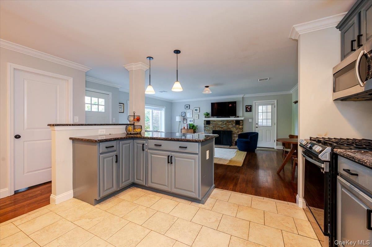 Fireplace, Interior, Kitchen, Living room, Pendant Lights, Wood Texture Flooring
