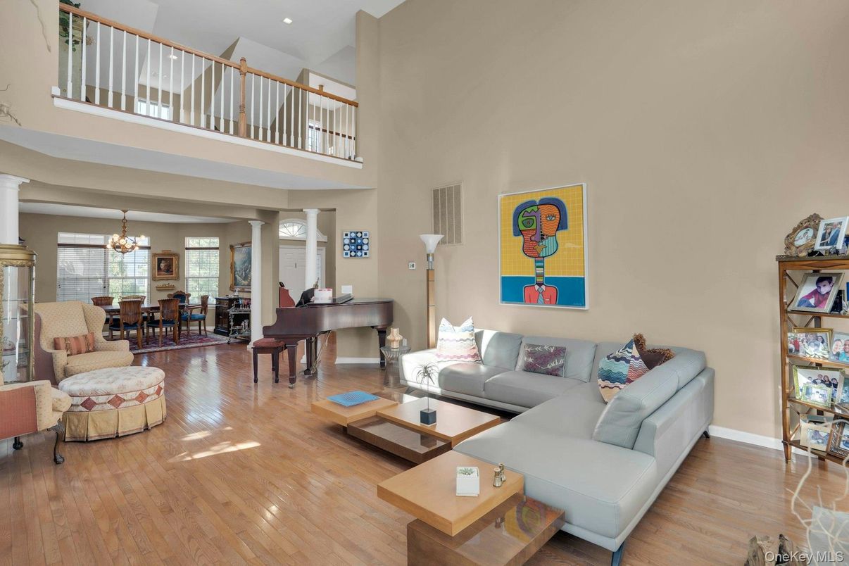 Chandelier, Dining room, Interior, Living room, Piano, Recessed Lighting, Wood Texture Flooring