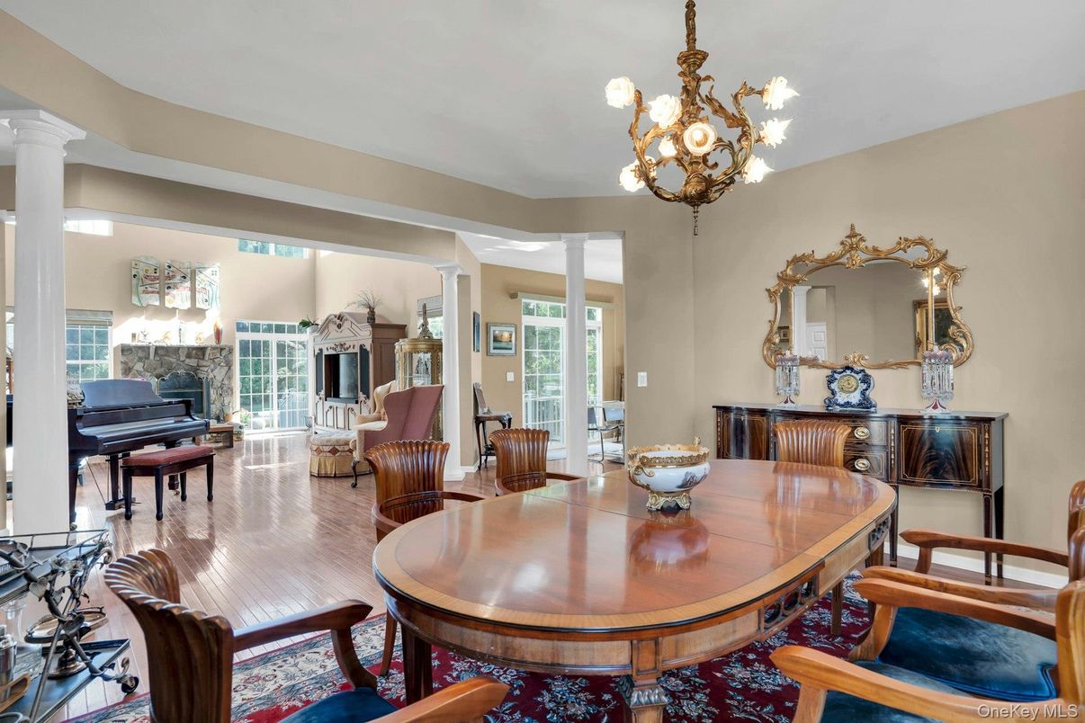 Chandelier, Dining room, Interior, Piano, Wood Texture Flooring
