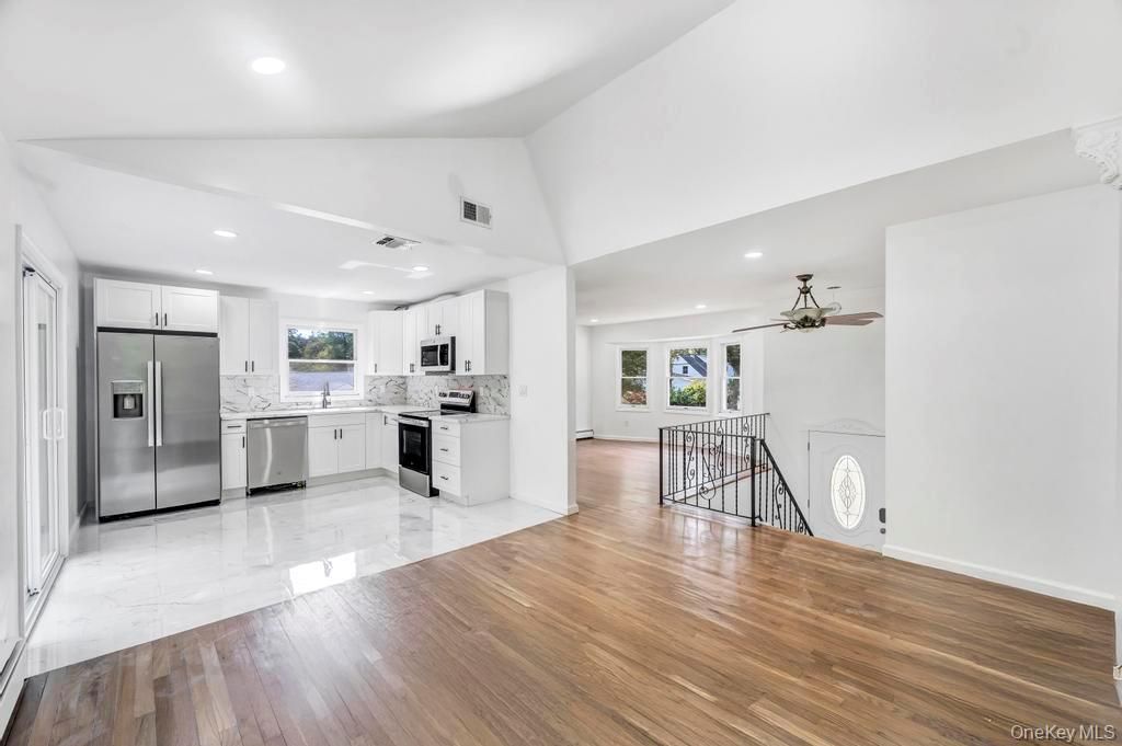 Interior, Kitchen, Marble, Recessed Lighting, Stainless Steel Appliances, Wood Texture Flooring
