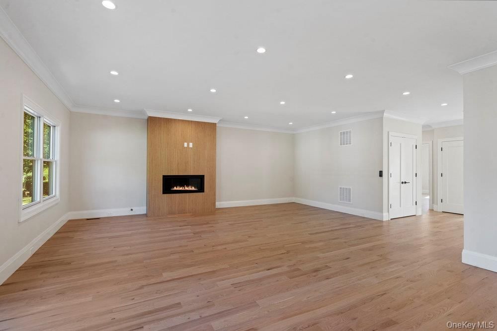 Empty room, Fireplace, Interior, Recessed Lighting, Wood Texture Flooring