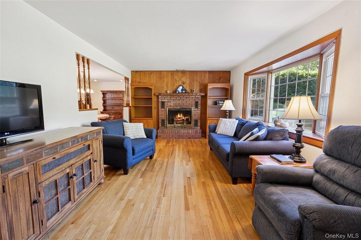 Fireplace, Interior, Living room, Recessed Lighting, Wood Texture Flooring, Wooden Walls