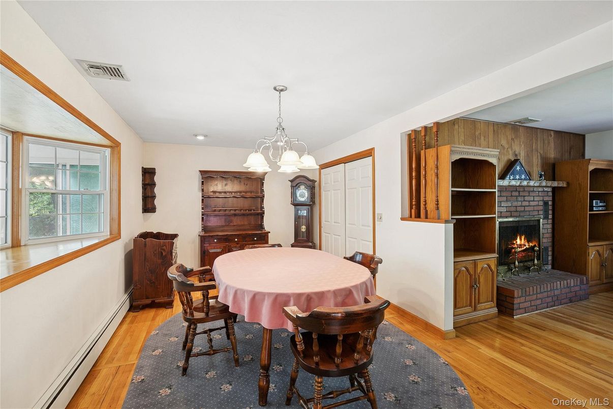 Chandelier, Dining room, Fireplace, Interior, Pendant Lights, Recessed Lighting, Wood Texture Flooring