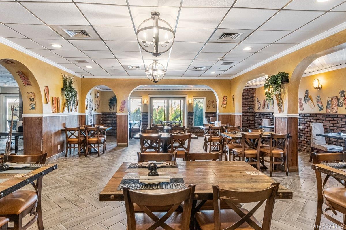 Dining room, Fireplace, Interior, Pendant Lights, Recessed Lighting, Wood Texture Flooring