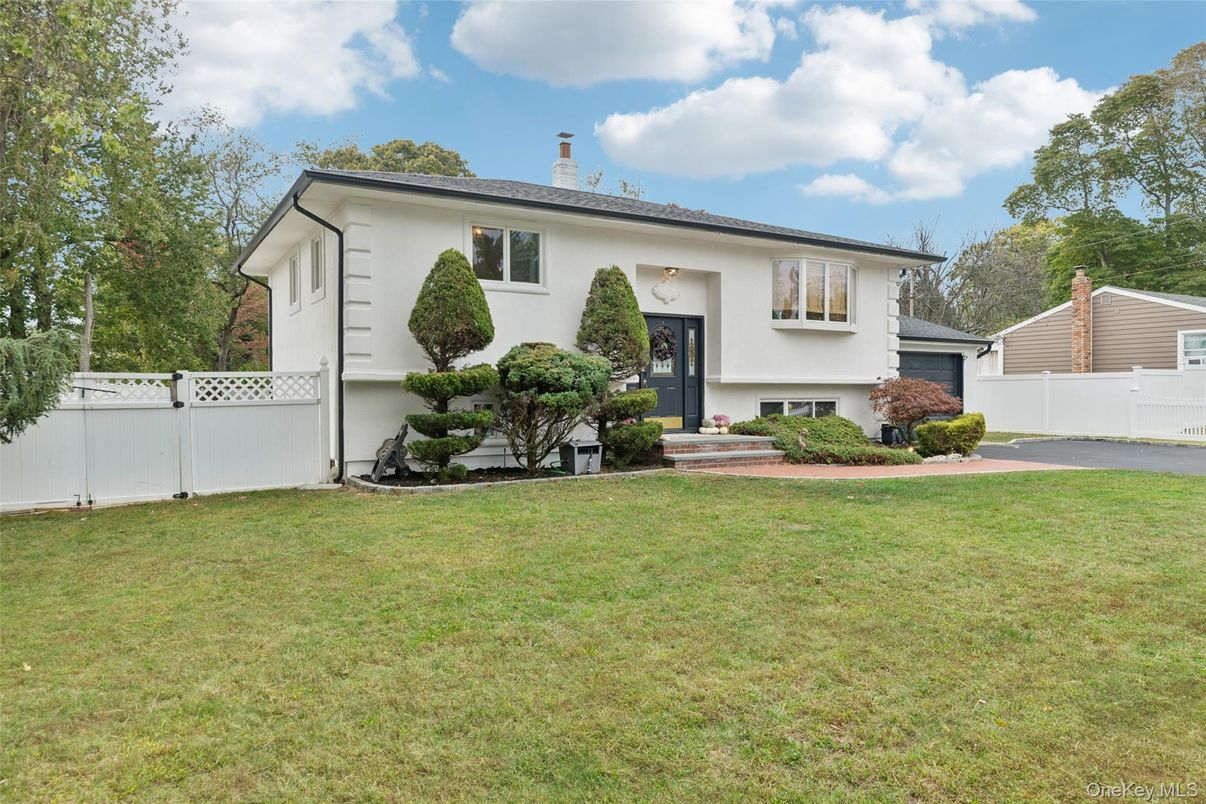 Attached, Backyard, Exterior, Facade, Raised Ranch