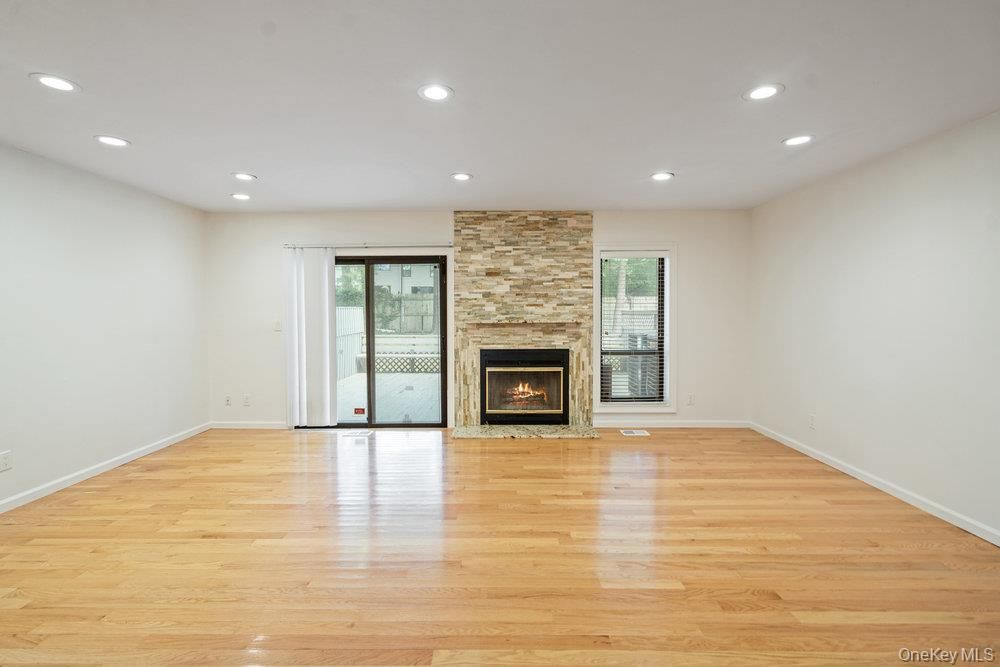 Empty room, Fireplace, Interior, Recessed Lighting, Wood Texture Flooring