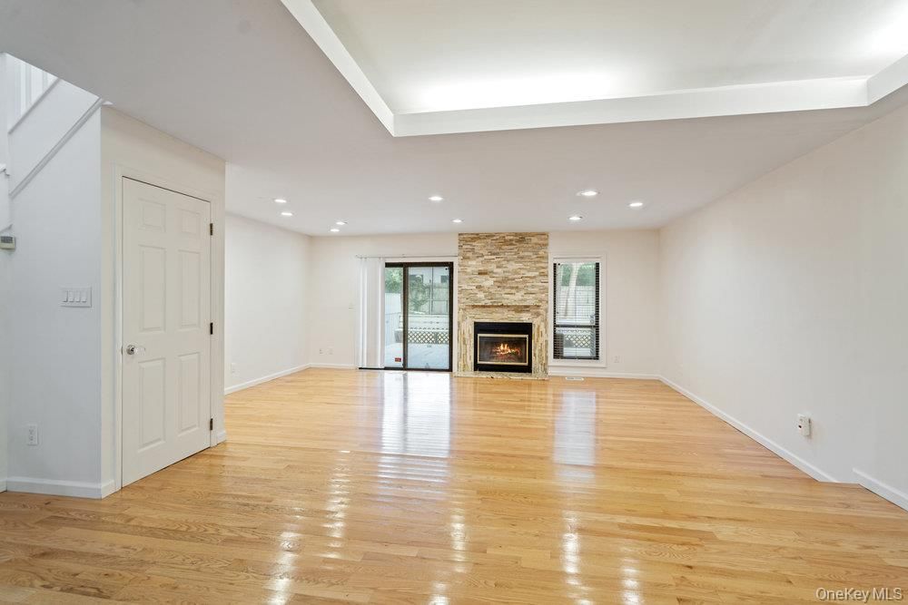 Empty room, Fireplace, Interior, Recessed Lighting, Wood Texture Flooring