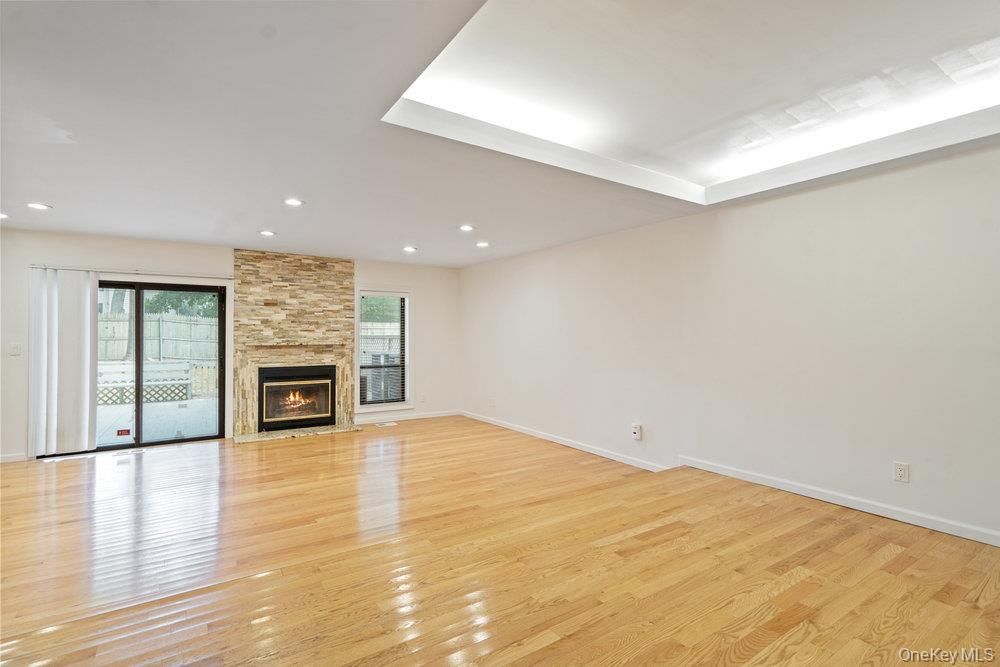 Empty room, Fireplace, Interior, Recessed Lighting, Wood Texture Flooring