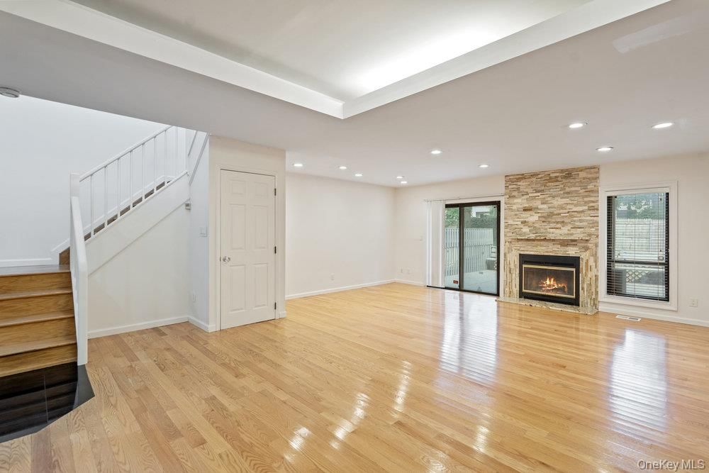 Empty room, Fireplace, Interior, Recessed Lighting, Wood Texture Flooring