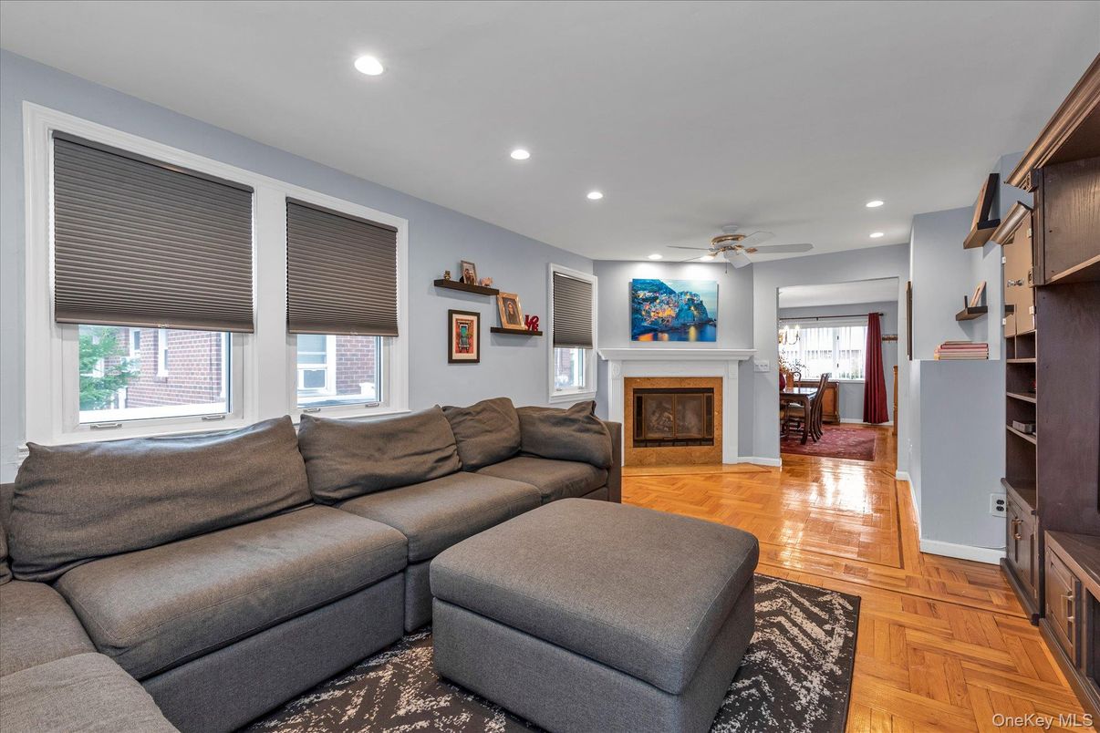 Dining room, Fireplace, Interior, Living room, Recessed Lighting, Wood Texture Flooring