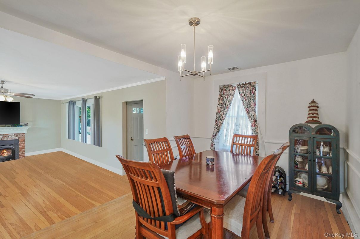 Dining room, Fireplace, Interior, Pendant Lights, Wood Texture Flooring