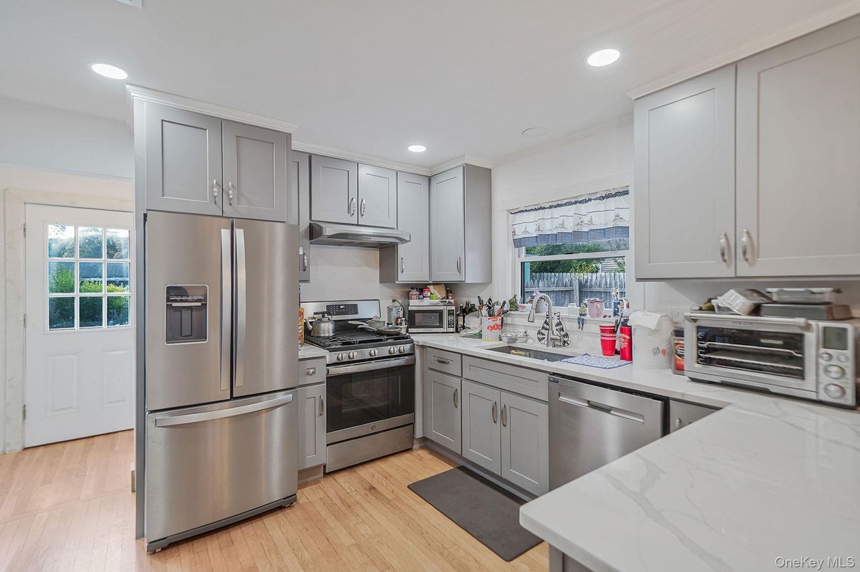 Interior, Kitchen, Recessed Lighting, Stainless Steel Appliances, Wood Texture Flooring