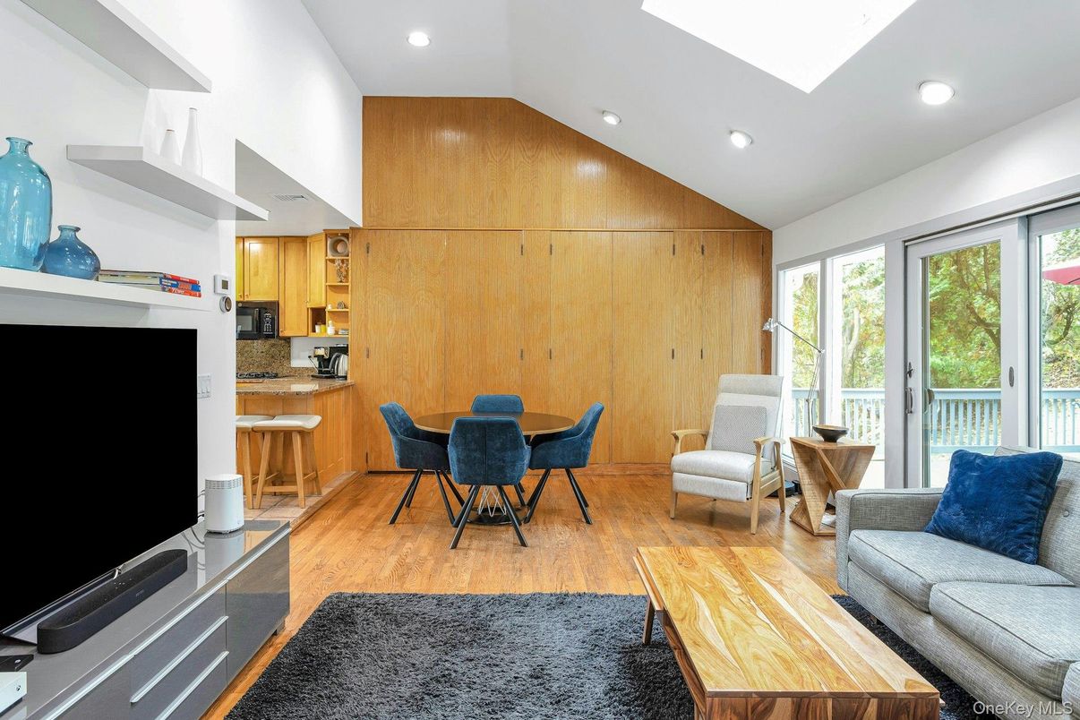 Dining room, Interior, Kitchen, Living room, Recessed Lighting, Wood Texture Flooring, Wooden Walls
