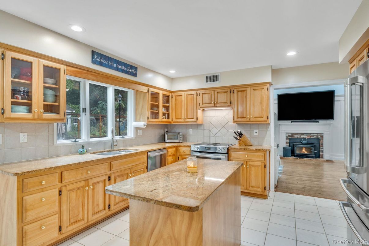 Fireplace, Interior, Kitchen, Recessed Lighting, Stainless Steel Appliances, Wood Texture Flooring