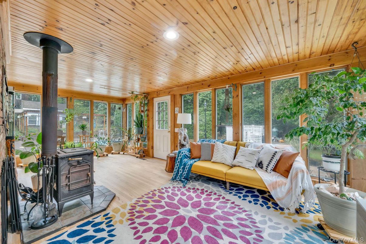 Fireplace, Interior, Living room, Recessed Lighting, Sun Room, Wooden Ceilings, Wood Texture Flooring