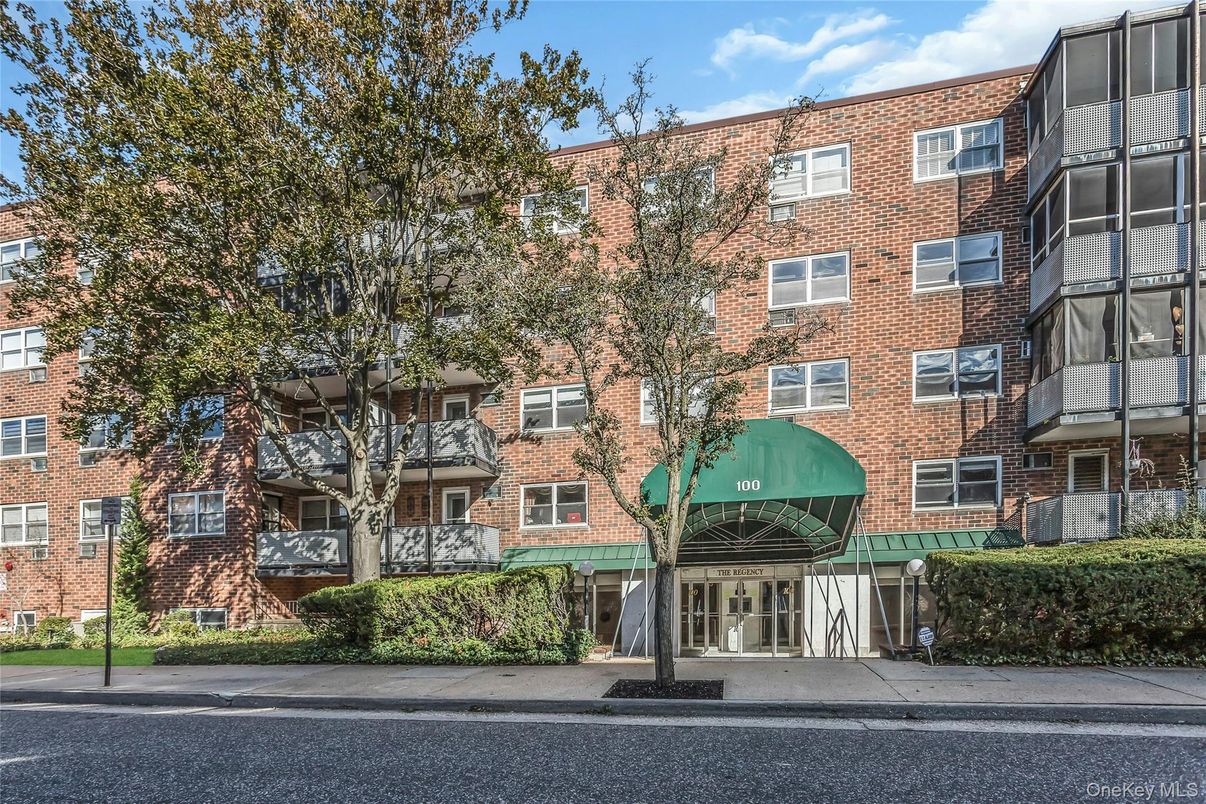 Exterior, Facade, Brick Facade, Condo Building