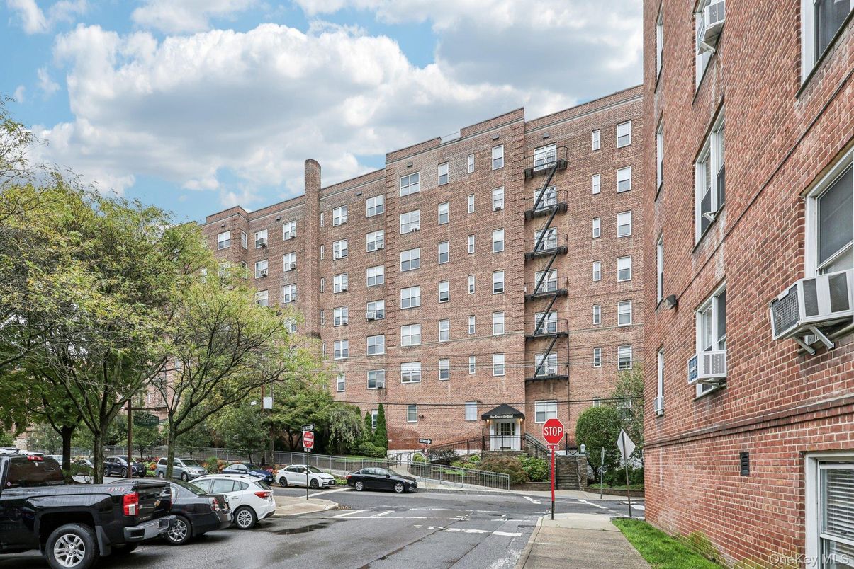 Exterior, Facade, Brick Facade, Condo Building