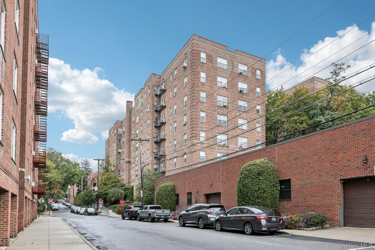 Exterior, Facade, Brick Facade, Condo Building